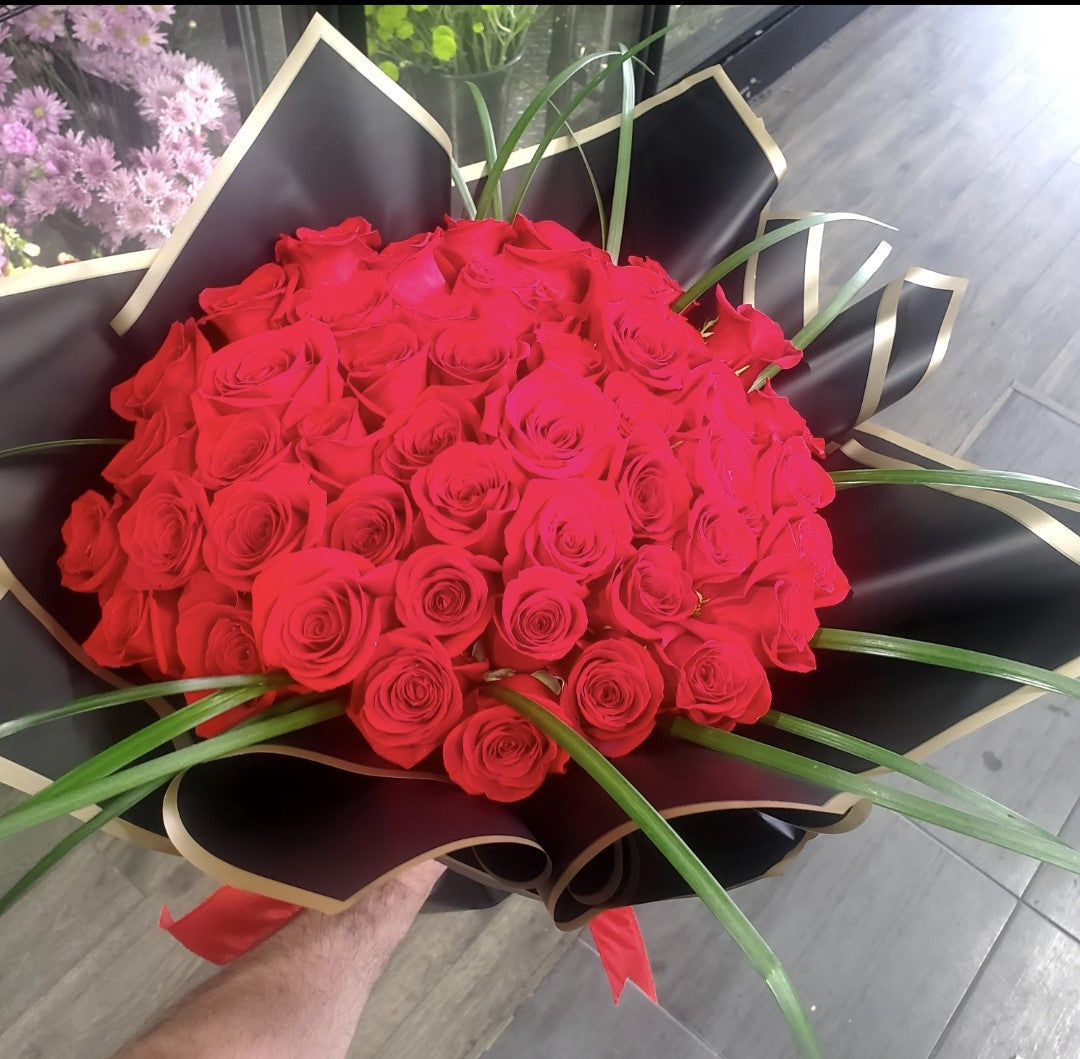 50 Red roses tied bouquet